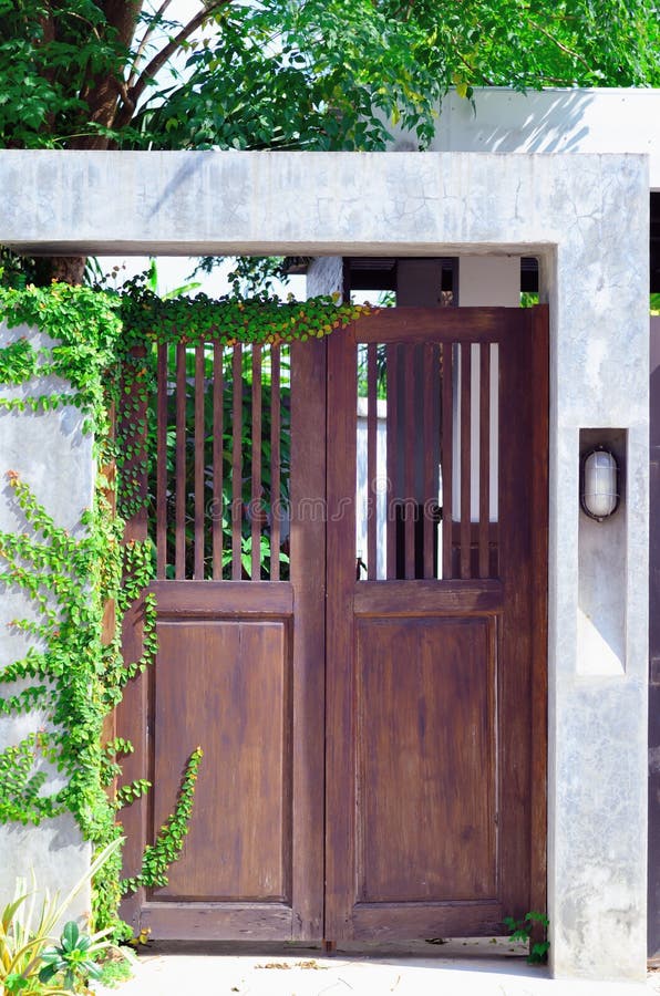 Closed Ornate Front Door of an Upscale Stucco House Stock Image - Image ...