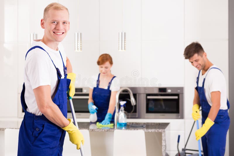 House cleaner with friends stock photo. Image of apartment 82937726