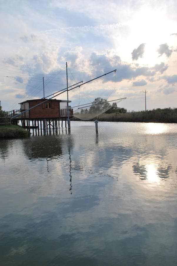 House and fishing net stock photo. Image of reflection 16923418