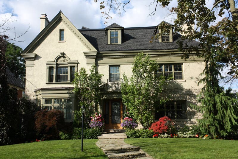 House with Gable and Dormers Stock Image - Image of gable, flower: 10954301