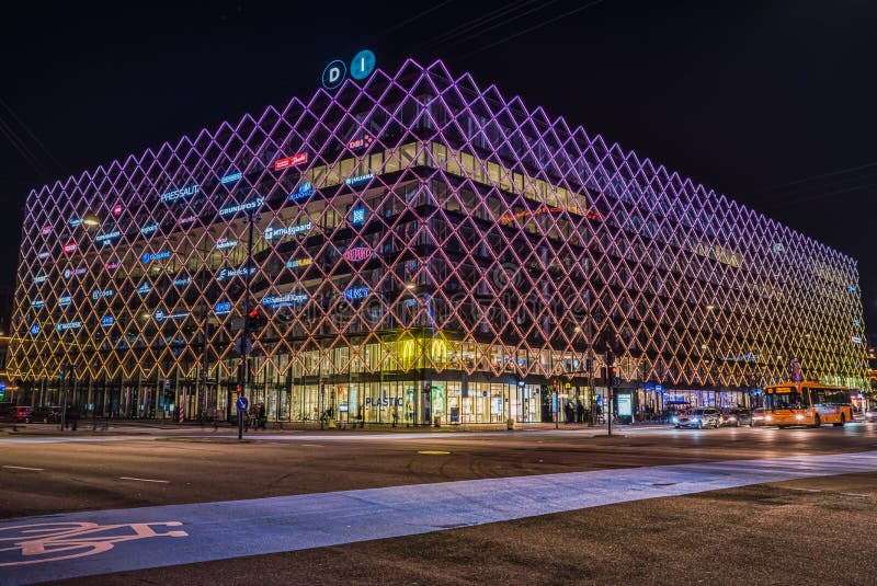 The House of Industry Industriens Hus in the Radhuspladsen at night time with intense neon lighting on the facade. Copenhagen. The House of Industry Industriens stock photos The House of Industry Industriens Hus in the Radhuspladsen at night time with intense neon lighting on the facade. Copenhagen. The House of Industry Industriens stock photos