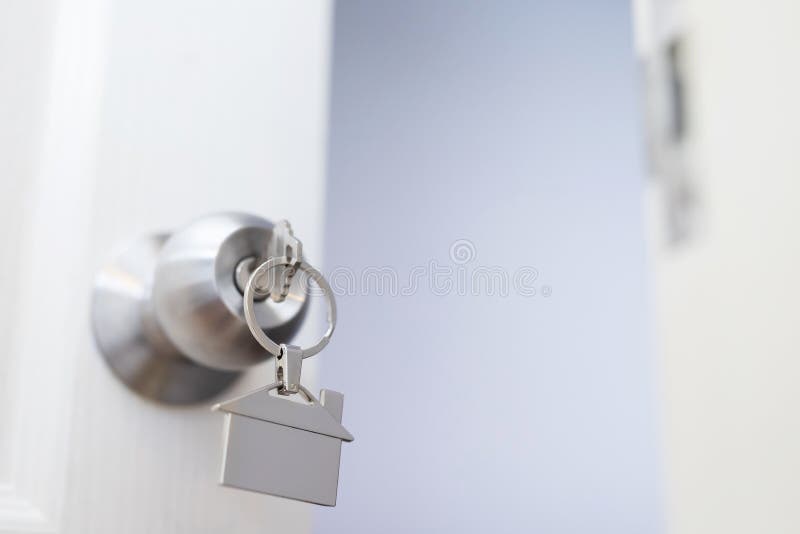 House Key On Home Shaped Key Chain Silver Keyring In The