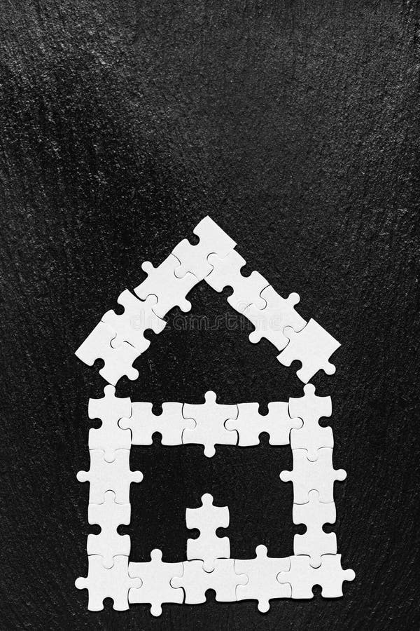 House made of puzzles. Modern house puzzle white pieces for concept design. Jigsaw Home, building, exterior. Puzzle construction stock photo House made of puzzles. Modern house puzzle white pieces for concept design. Jigsaw Home, building, exterior. Puzzle construction stock photo