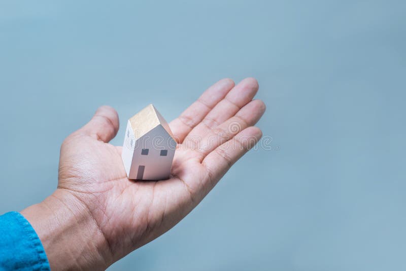 House model on human hands.