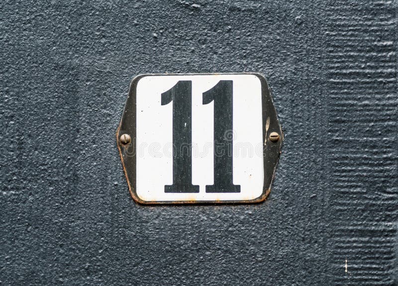 House Number 11 Black number on white plate