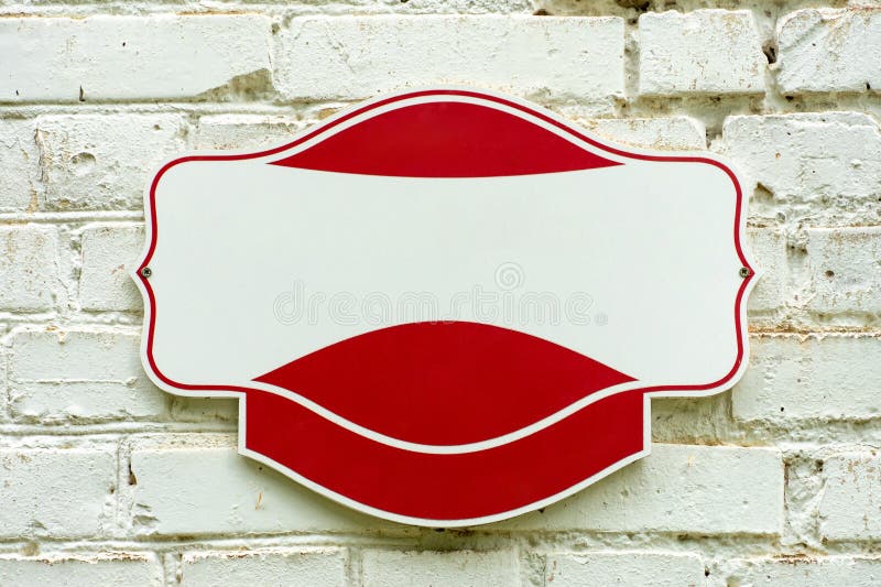 House number plate on a painted brick wall stock images