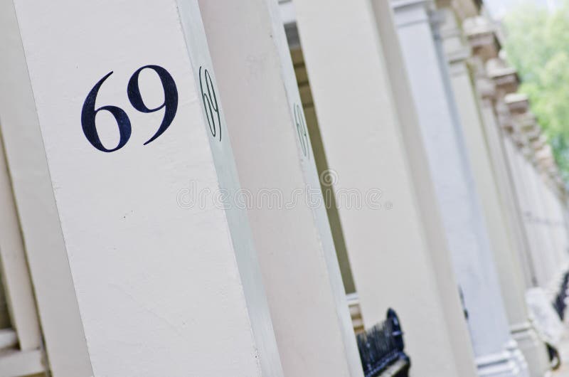 House Number 69 on White Pillar in London. Stock Image Image of