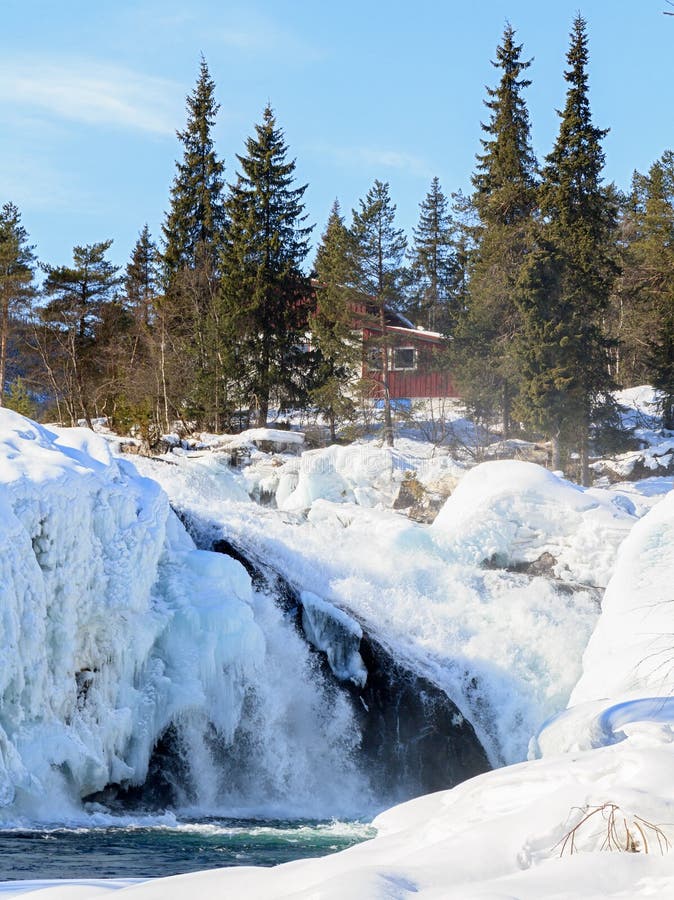 House over a waterfall stock image. Image of blue, scenics 30440355