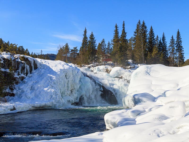 House over a waterfall stock image. Image of blue, scenics 30440355