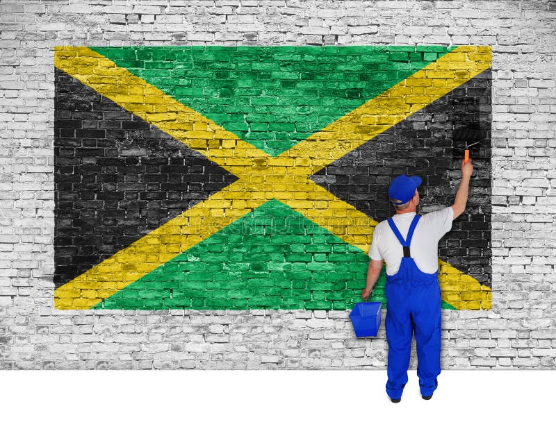 House painter covers brick wall with flag of Jamaica