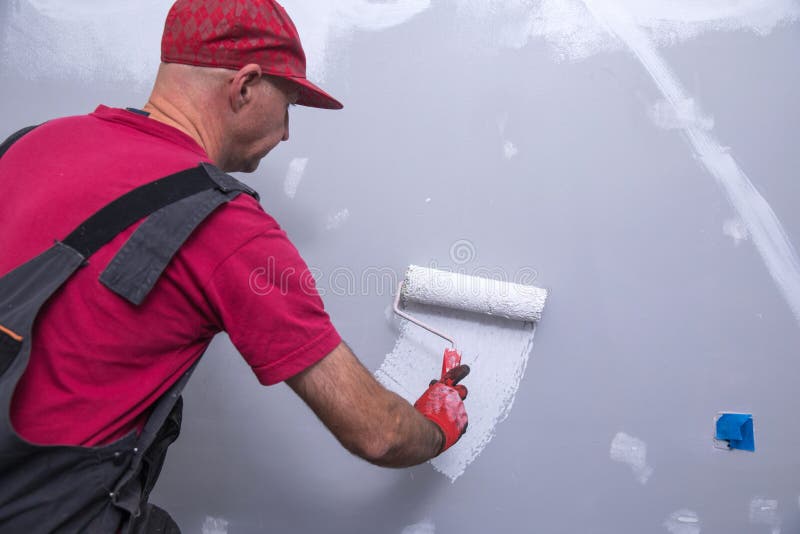 House Painting Business, Tradesman Painting a Wall Stock Image Image of decoration, renovating