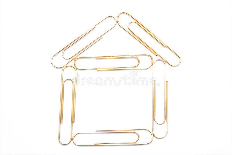 House from paper clips on the white isolated backg