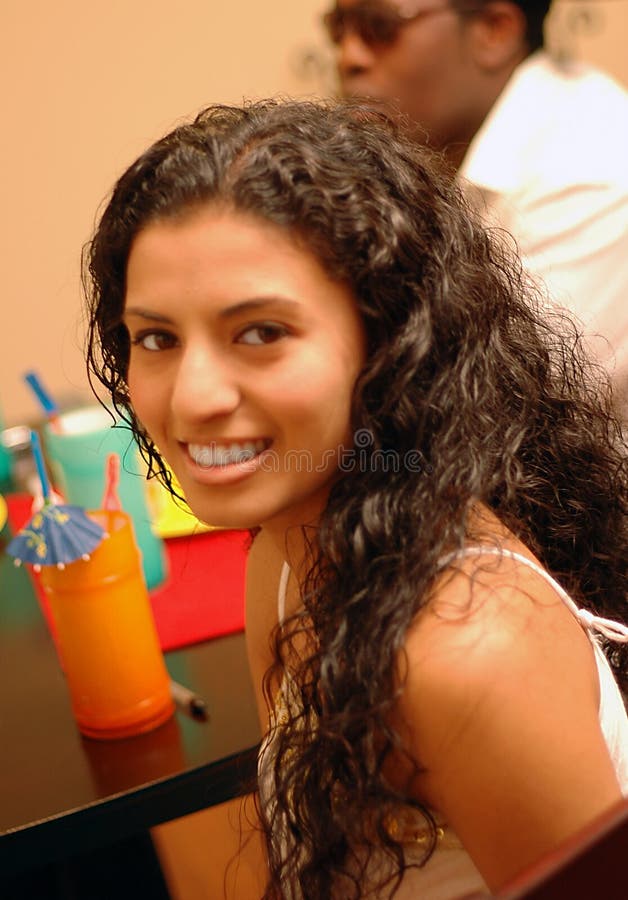 Beautiful girl of Indian (India) descendancy at a house party. Beautiful girl of Indian (India) descendancy at a house party.