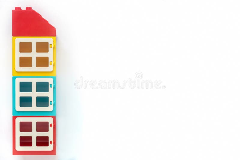 Lego bricks. House of plastic constructor bricks on white background. Popular toys. Free space for text royalty free stock images Lego bricks. House of plastic constructor bricks on white background. Popular toys. Free space for text royalty free stock images