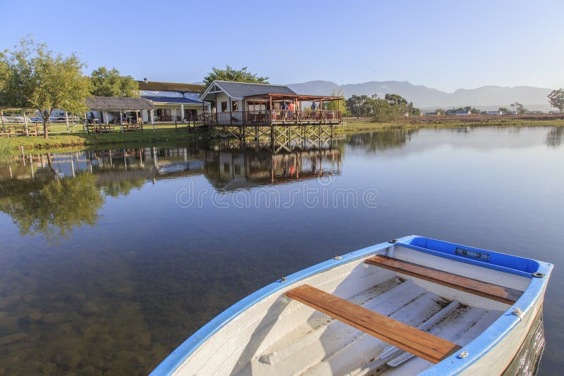 House reflected in scenic lake stock photo House reflected in scenic lake stock photo