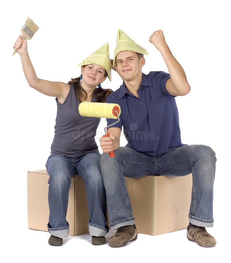House renovation - happy couple at the boxes stock photos House renovation - happy couple at the boxes stock photos