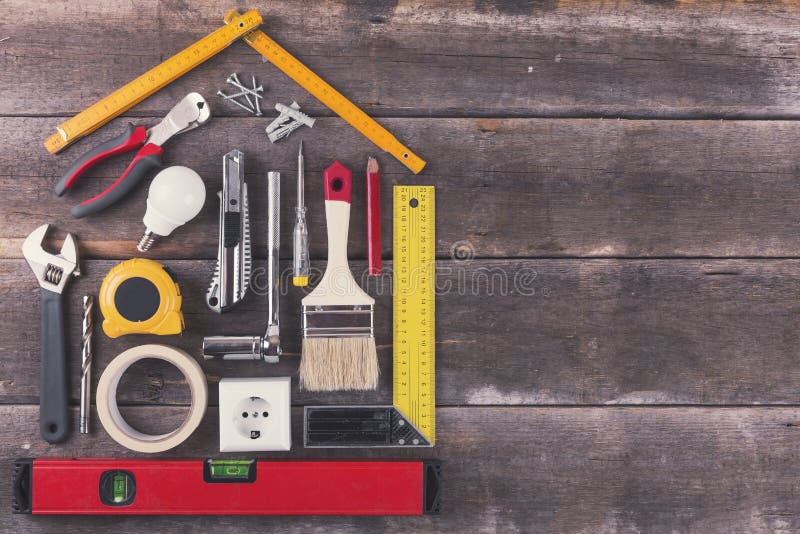 House renovation and improvement DIY tools on wooden backgro stock photography