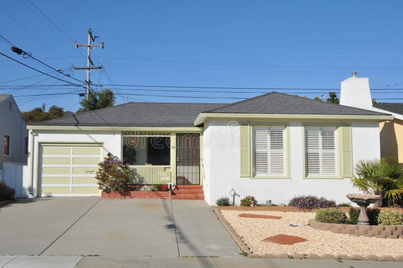 House surrounded by trees and grass