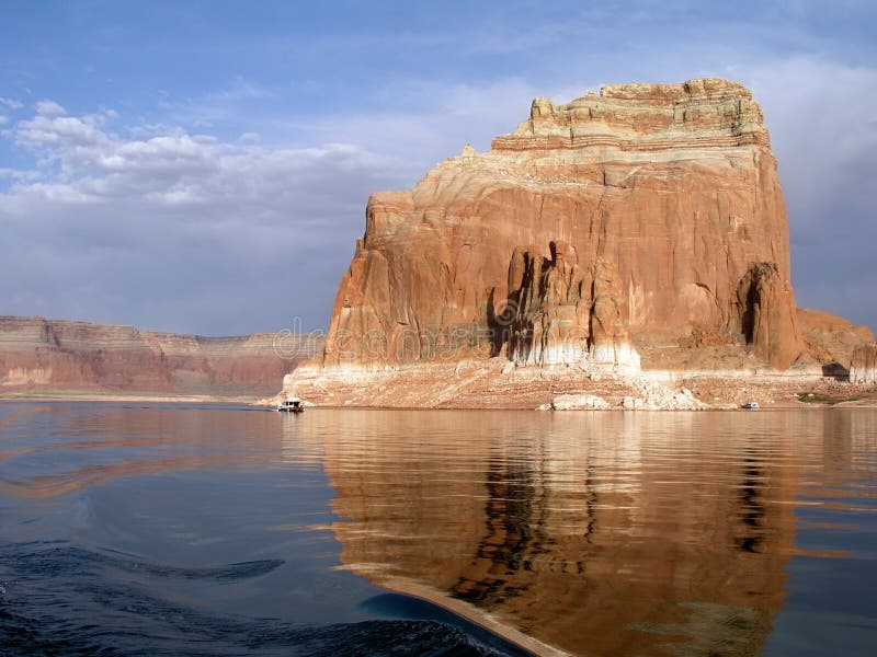 Houseboats at a monolith at Lake Powell