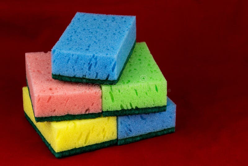 Household Cleaning Sponges on a Red Cloth Stock Photo Image of