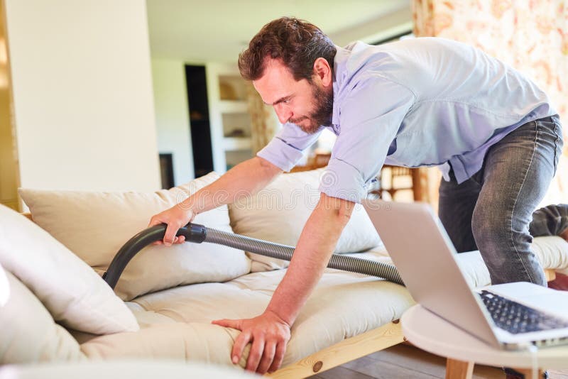 House Man Vacuuming a Laptop Stock Image Image of cleanup, cleaner