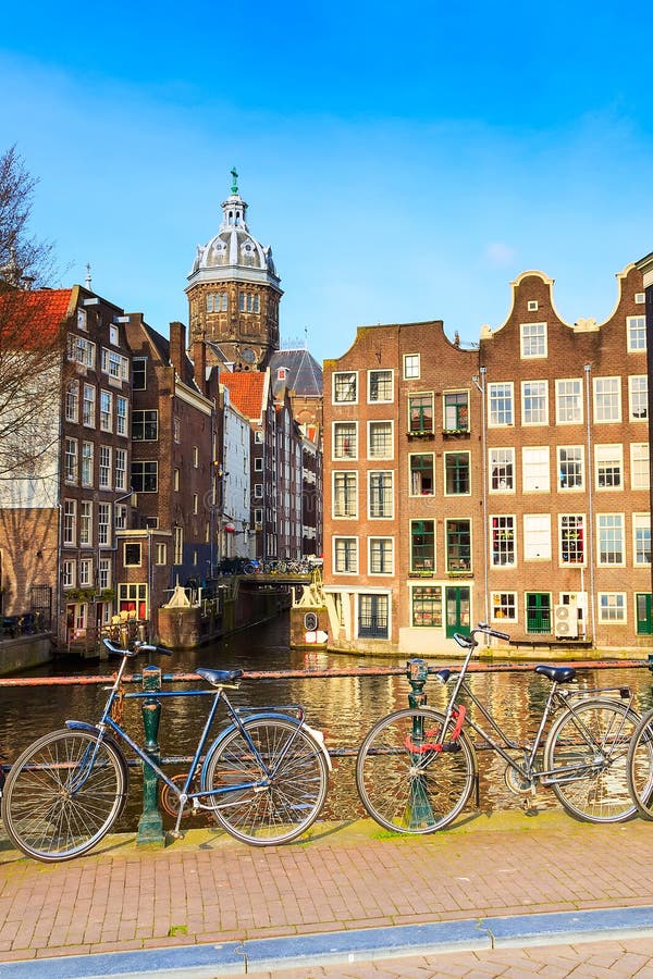 Houses, canal, bridge in Amsterdam, Netherlands