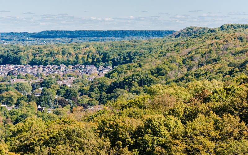 Houses Near Forested Hills Receding into Distance. Stock Image - Image ...