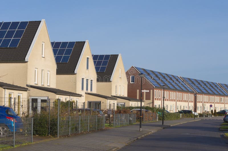 Houses with solar panels stock image. Image of blue, environment 77144083