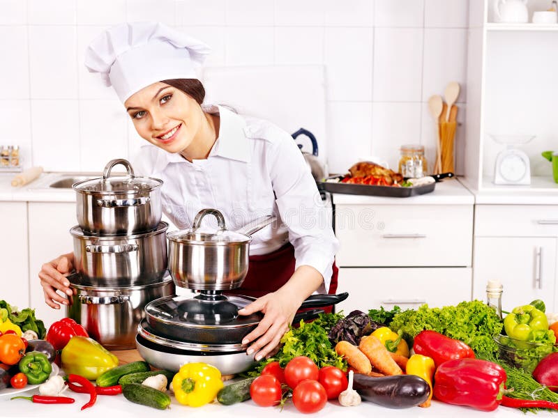 Housewife Cooking at Kitchen. Stock Photo - Image of cuisine, preparation:  34070354