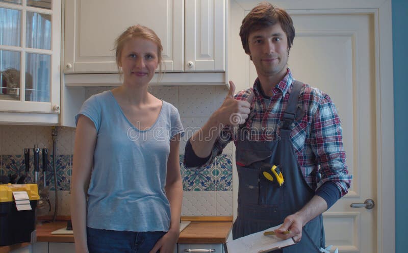 housewife plumber in kitchen