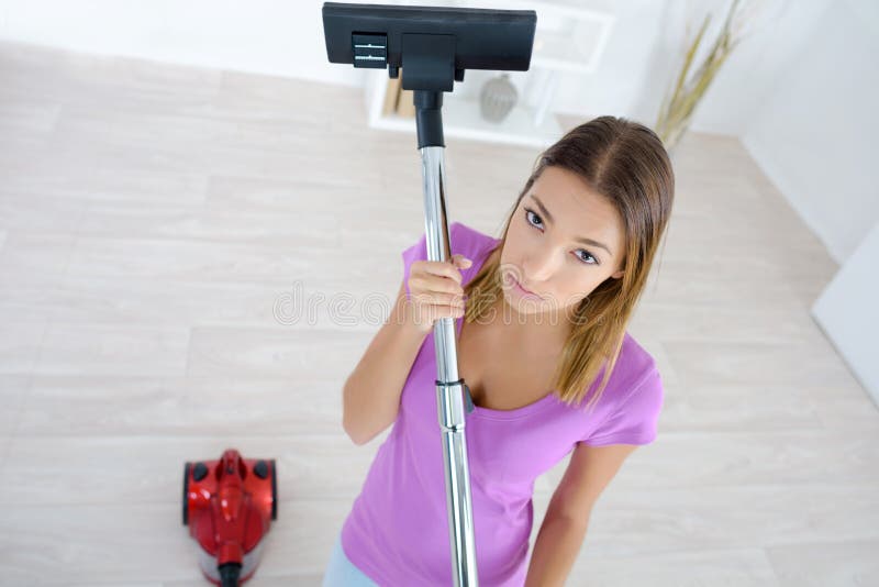 Sexy Housewife Vacuum Cleaner Stock Photos pic