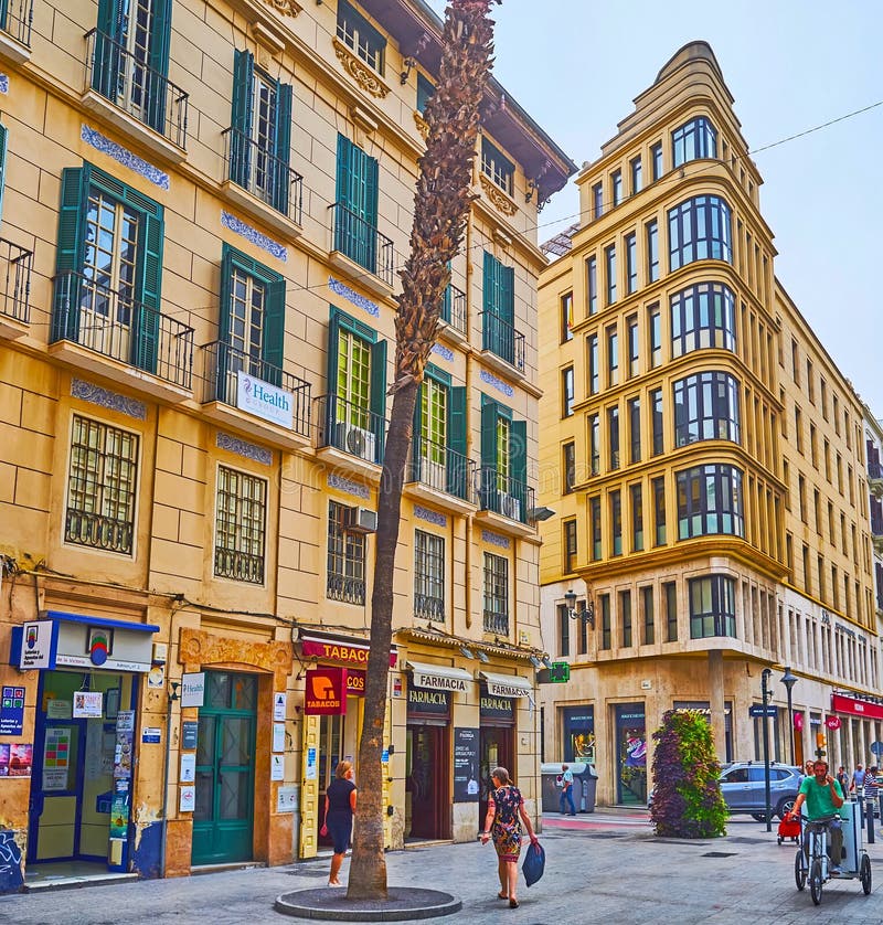 MALAGA, SPAIN - SEPT 28, 2019: Calle Puerta del Mar with shops and boutiques, on Sept 28 in Malaga. MALAGA, SPAIN - SEPT 28, 2019: Calle Puerta del Mar with shops and boutiques, on Sept 28 in Malaga