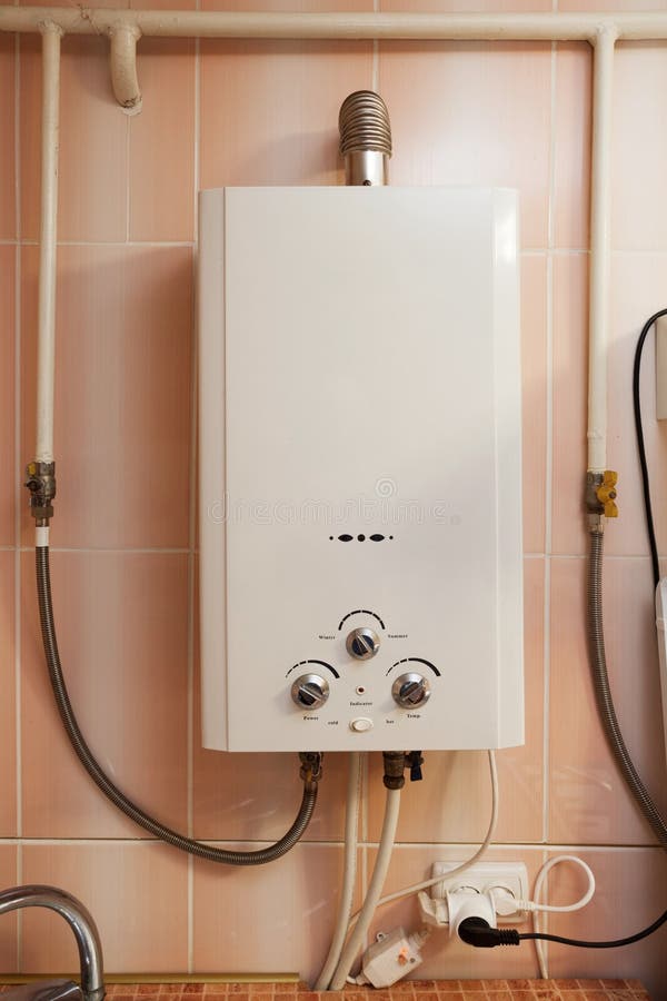 Housing Equipment Gas Water Heater in the Kitchen. Stock Image