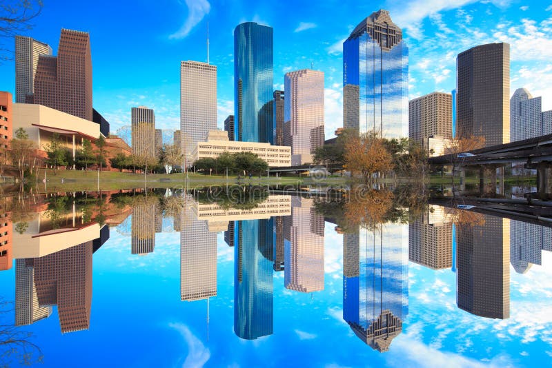 Houston Texas Skyline with modern skyscrapers and blue sky view from park with reflection. Houston Texas Skyline with modern skyscrapers and blue sky view from park with reflection