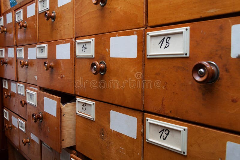 Wooden archive drawers, side view, horizontal shot. Wooden archive drawers, side view, horizontal shot.