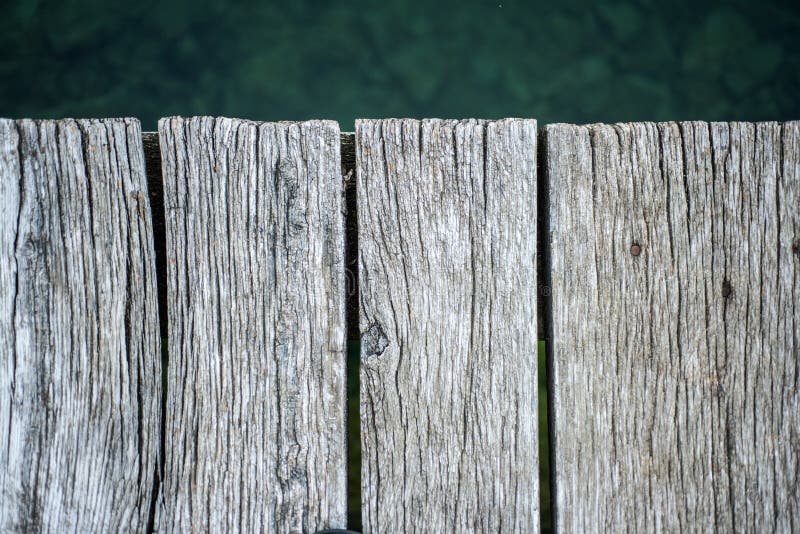 Houten strand Oude brug Houten textuurachtergrond De zomer en stille vakantie De oude houten Achtergrond van de Plank Oude achter royalty-vrije stock afbeeldingen Houten strand Oude brug Houten textuurachtergrond De zomer en stille vakantie De oude houten Achtergrond van de Plank Oude achter royalty-vrije stock afbeeldingen