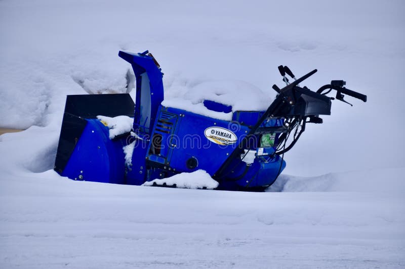 Hovden, Norway, February 21, 2023. Blue Yamaha Snow Blower in the snow.