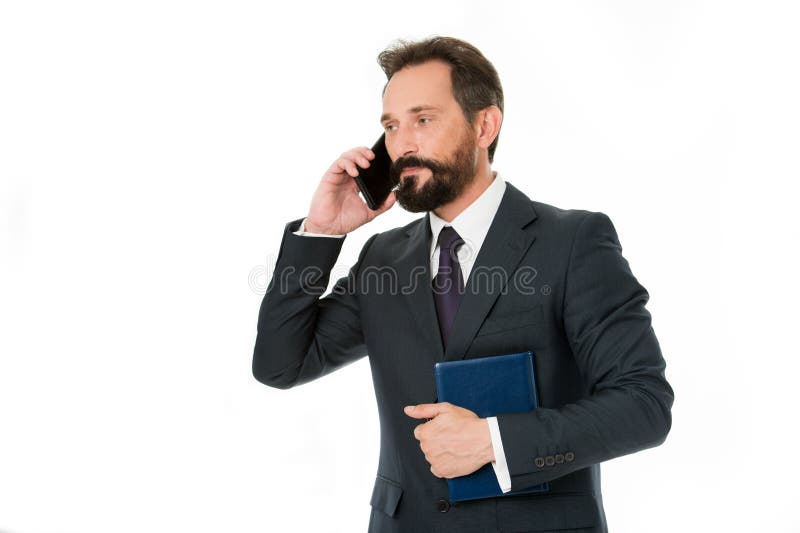 How can i help you. Businessman calling client hold notepad. Man bearded manager phone conversation smiling face stock photos How can i help you. Businessman calling client hold notepad. Man bearded manager phone conversation smiling face stock photos