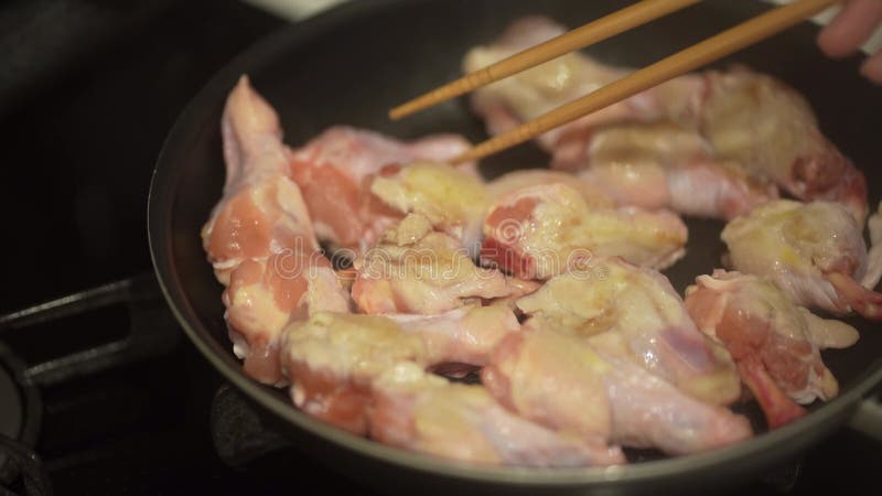 How to fry chicken wings stock footage. Video of chicken - 325280026