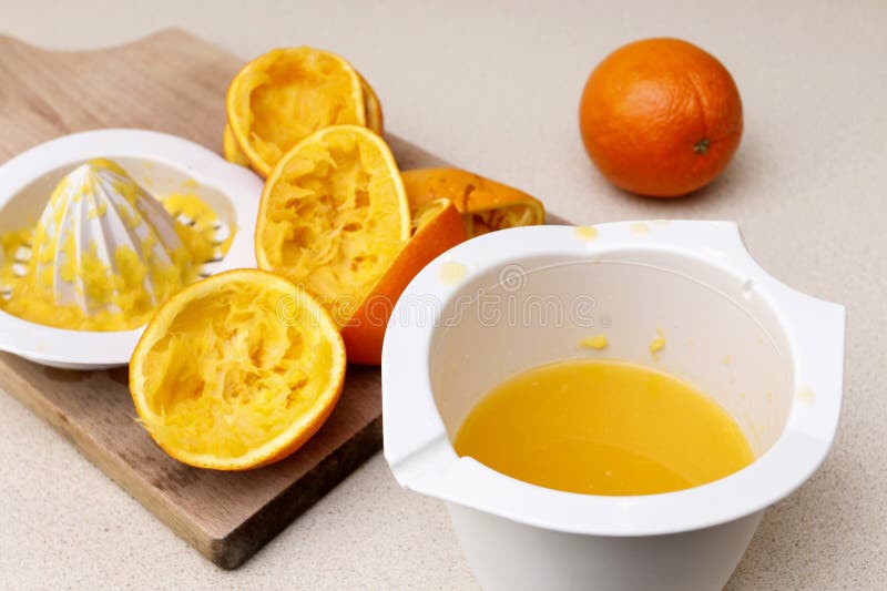 How to make a fresh orange juice. Step by step, tutorial stock images