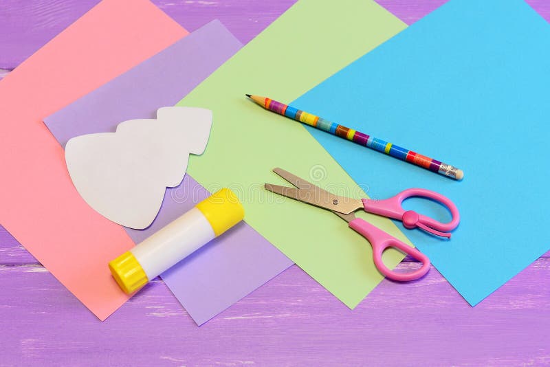 How to make paper Christmas card. Step. Colored paper set, scissors, pencil, Christmas tree template, glue stick