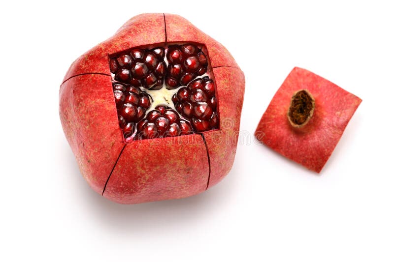 How to peel a pomegranate white background fotografia stock