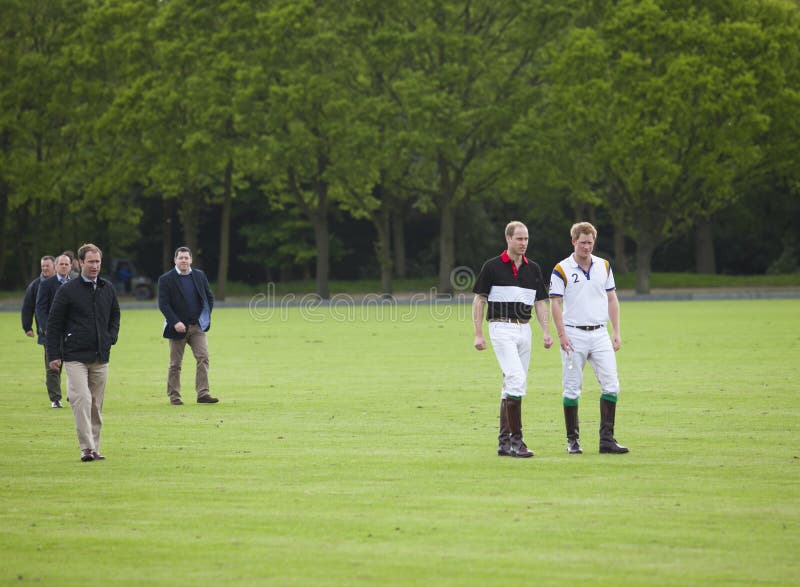 Berkshire, United Kingdom-May 11, 2014: HRH Prince William and HRH Prince Harry in attendance for the De Beers Diamond Jewelers Royal Charity Polo Cup, Billingbear Polo Club. Berkshire, United Kingdom-May 11, 2014: HRH Prince William and HRH Prince Harry in attendance for the De Beers Diamond Jewelers Royal Charity Polo Cup, Billingbear Polo Club