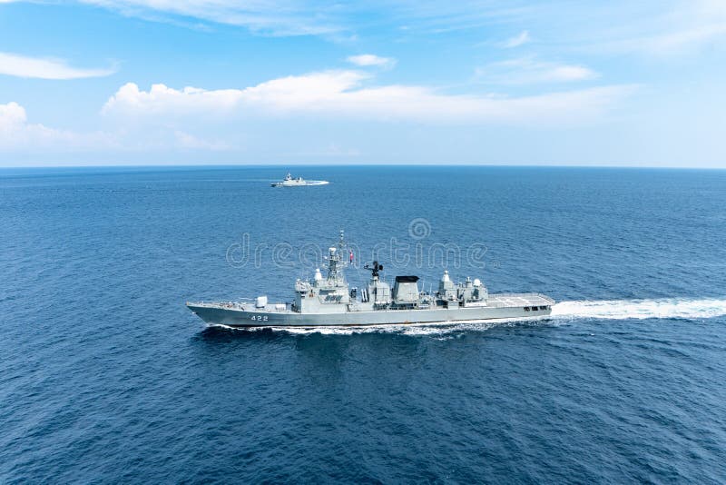 ANDAMAN SEA, THAILAND - APRIL 9, 2019 : HTMS Taksin FFG 422 and HTMS Bhumibol Adulyadej FFG471 the guided missile frigates of Royal Thai Navy sail in the sea during Guardian Sea 2019 Exercise