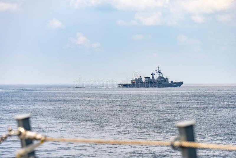 ANDAMAN SEA, THAILAND - APRIL 12, 2019 : HTMS Taksin FFG422 Guided missile frigate of Royal Thai Navy sails in the sea during Annual sea training. ANDAMAN SEA, THAILAND - APRIL 12, 2019 : HTMS Taksin FFG422 Guided missile frigate of Royal Thai Navy sails in the sea during Annual sea training