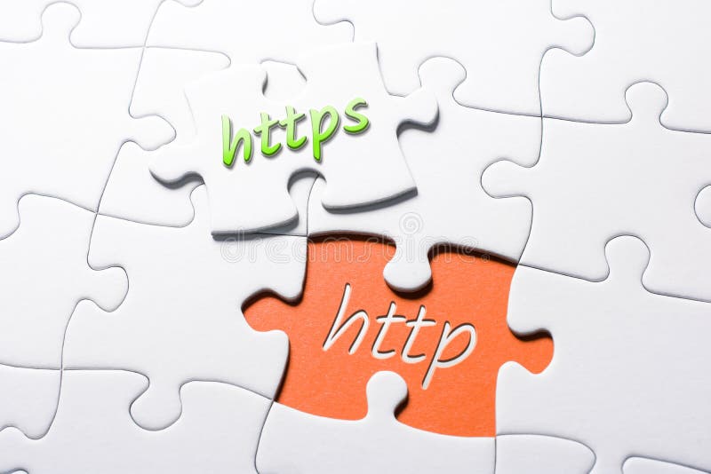HTTPS 和 HTTP 这两个词在一个未完成的拼图中 库存照片