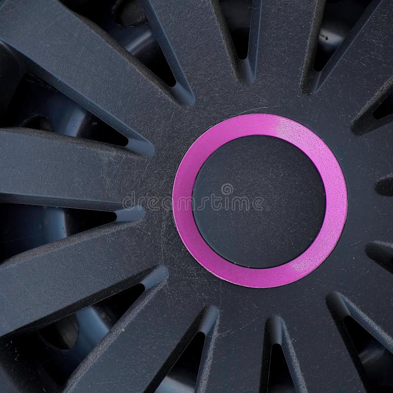 Hubcap with purple accent stock image. Image of ring 238812167