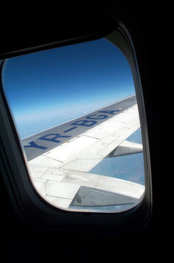 Hublot d'avion photographie stock Hublot d'avion photographie stock