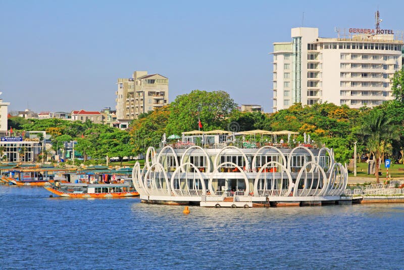 Hue Perfume River Riverbank And Tourist Boat, Vietnam. The Perfume River is a river that crosses the city of Hue royalty free stock images Hue Perfume River Riverbank And Tourist Boat, Vietnam. The Perfume River is a river that crosses the city of Hue royalty free stock images
