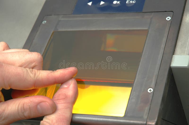 A finger print being taken to Automated Fingerprint Identification System. A finger print being taken to Automated Fingerprint Identification System
